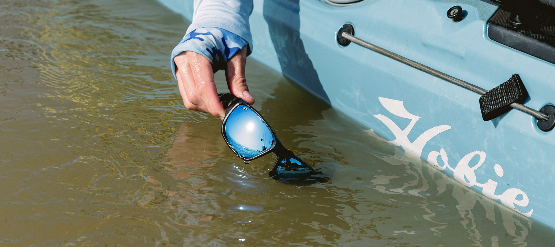 Hobie Eyewear Bluefin Polarized Sunglasses - Floating in the water